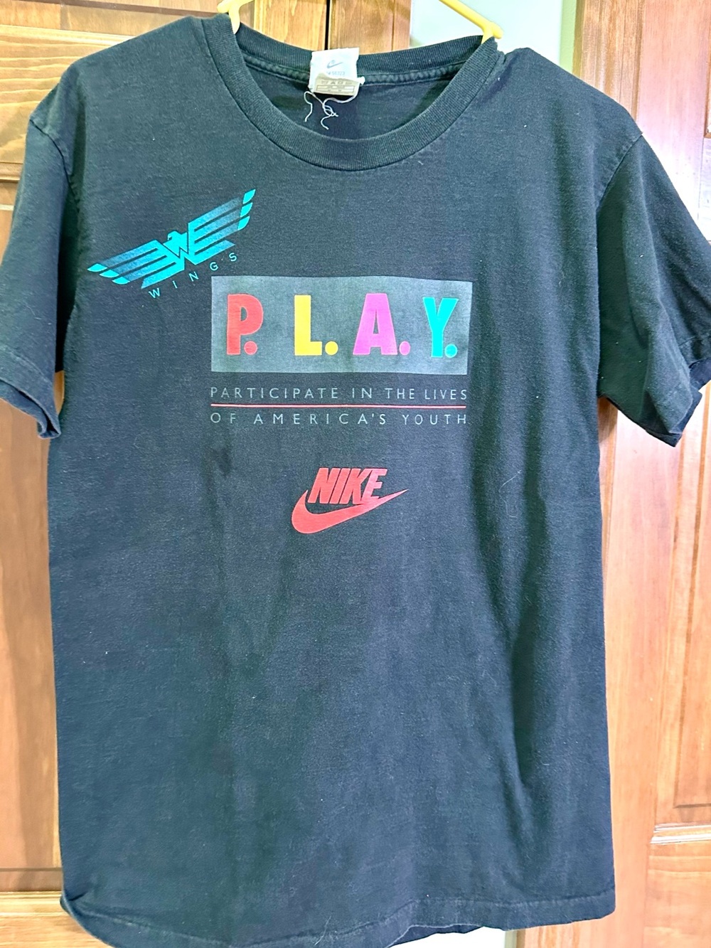 Nike Black Kids Short Sleeve Tee with Multicolor P.L.A.Y. Logo